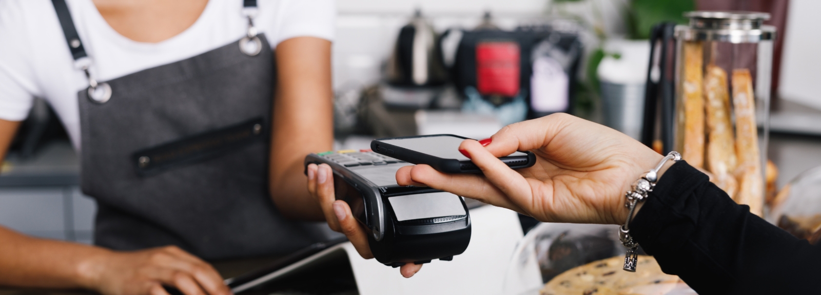 person paying with phone