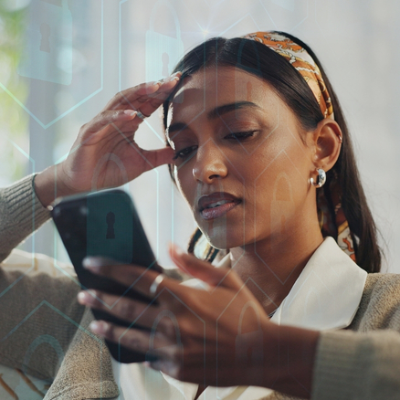 frustrated woman looking at her phone 