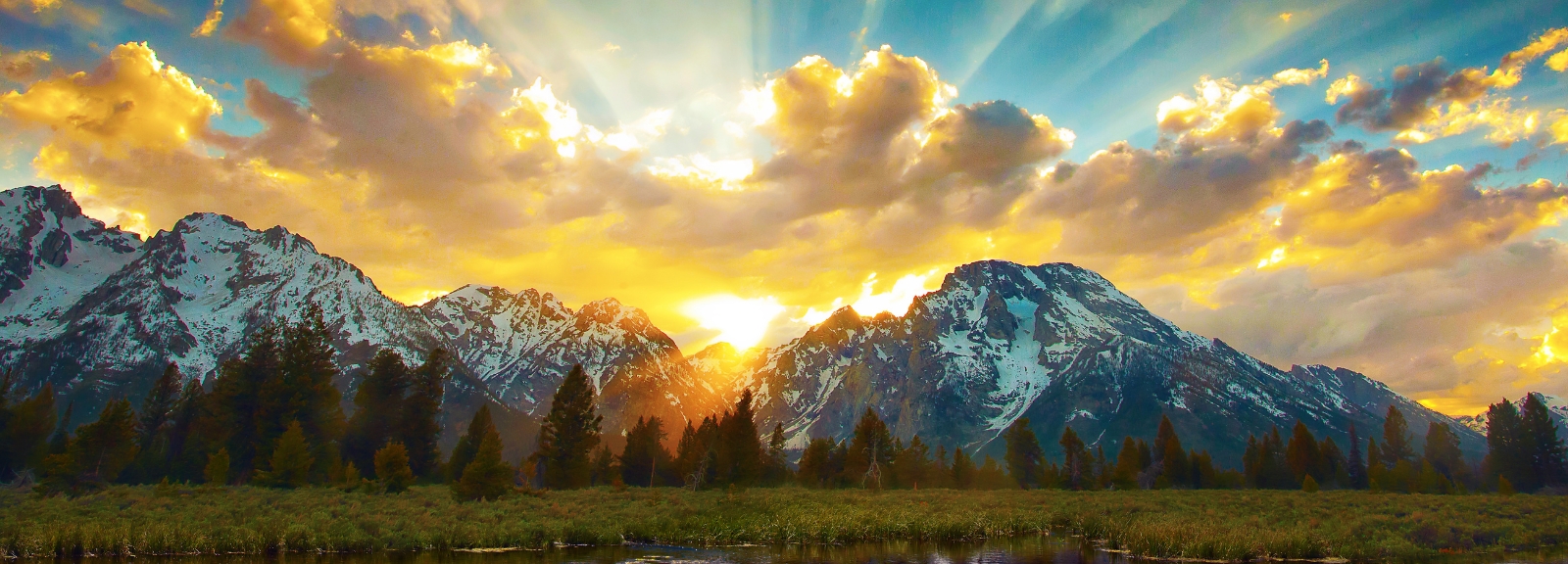 Grand Tetons and sunset