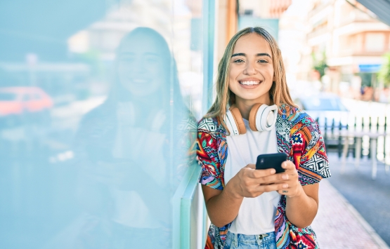 Teen girl blonde hair with phone