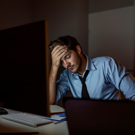 Man Frustrated at Computer