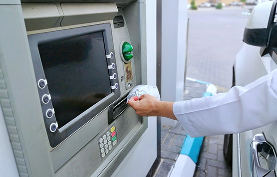 Person using drive-up ATM