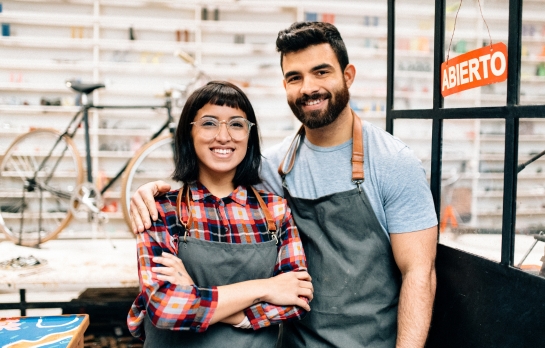 man and woman own bike shop