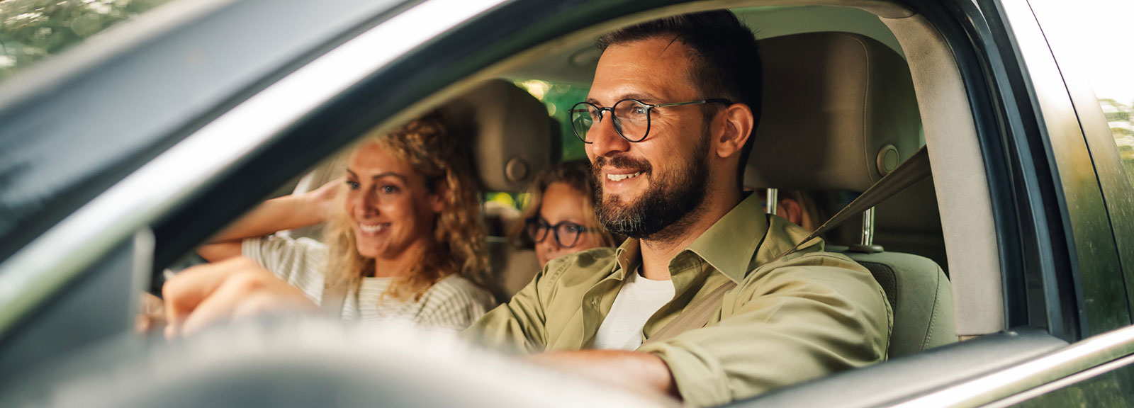 Family driving in car