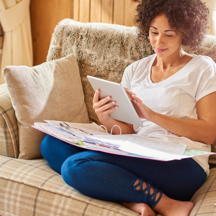 woman holding tablet