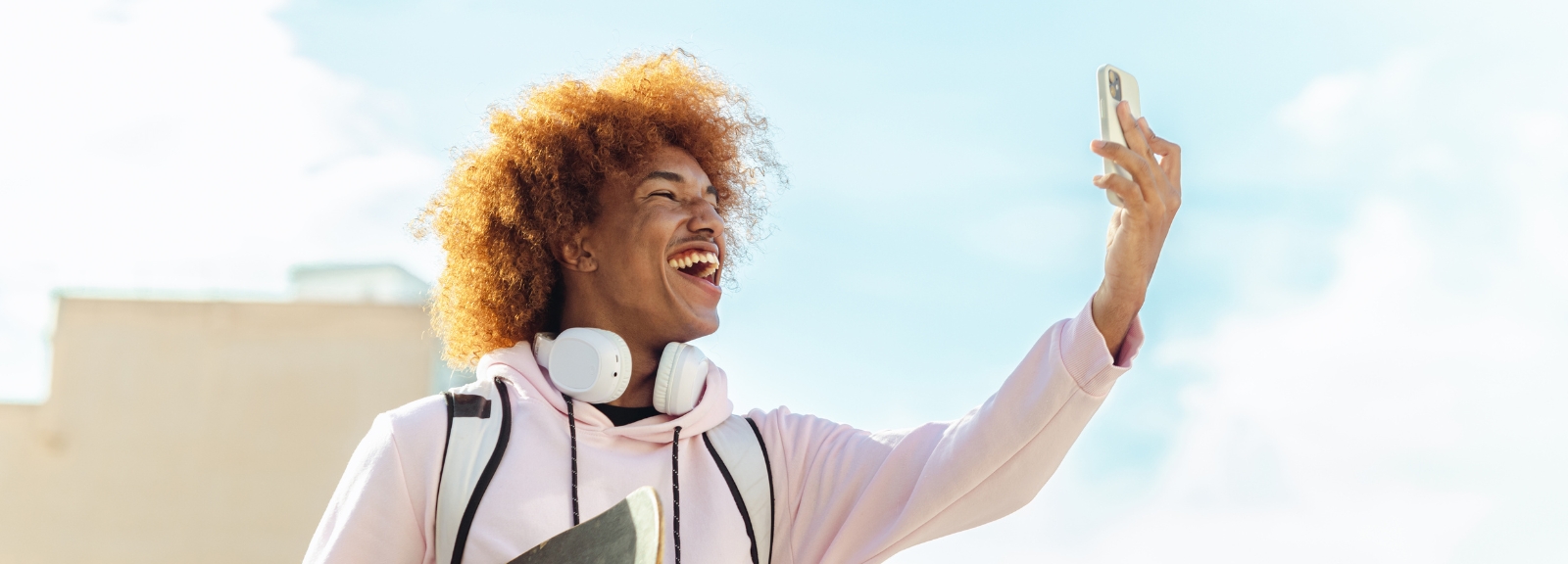 Teen smiling at phone