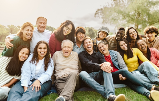 a large group of smiling people 