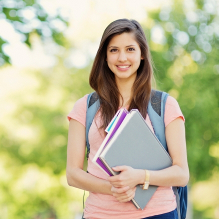 Student smiling for camera