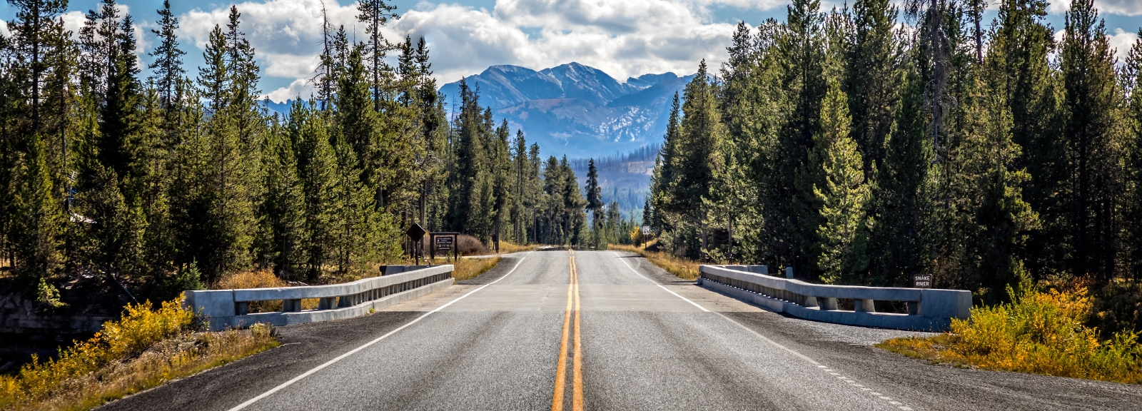 Long road leading to mountain