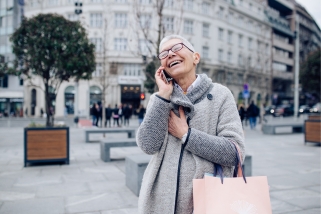 older lady laughing on phone