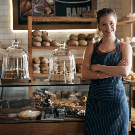 woman standing in bakery 