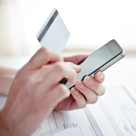 person working on digital banking on phone