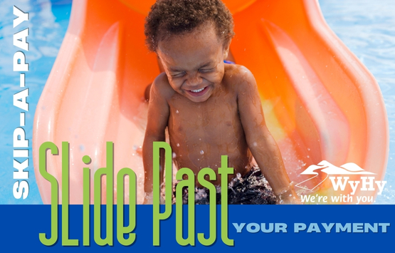 Boy on waterslide with words. Skip a pay. Slide past your payment