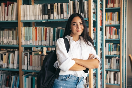 student in library